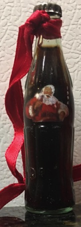 M06006-6 € 8,00 coca cola mini flesje kerstman.jpeg